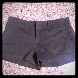 Black shorts with pockets tuck in the back